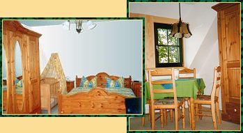 Foto Doppelzimmer Eichenblick mit Doppelbett, Kinderbett und Schrank sowie Küchenzeile